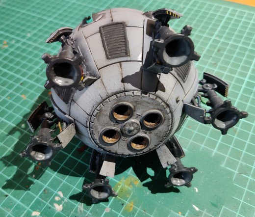 The bottom of an Overlord-C DropShip. It has some soot stains around the engine nozzles and along the bottom rim, as well as on the lower edges of its landing strut doors, both upper and lower halves.