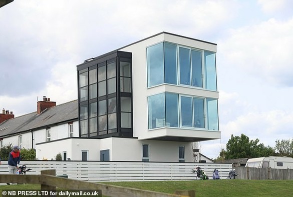 A controversial Grand Designs home has been dubbed 'a glorified greenhouse' by irate neighbours