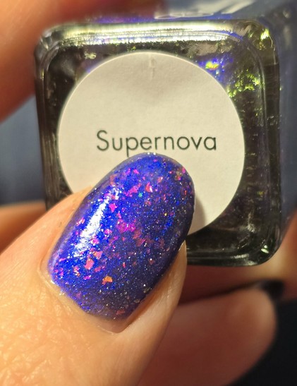 My thumb on the nail polish bottle tag
