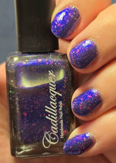 My fingers curled around the nail polish bottle