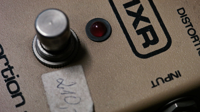 Close-up of an audio gadget. It is a still from the short film "Niki's Music Shop".