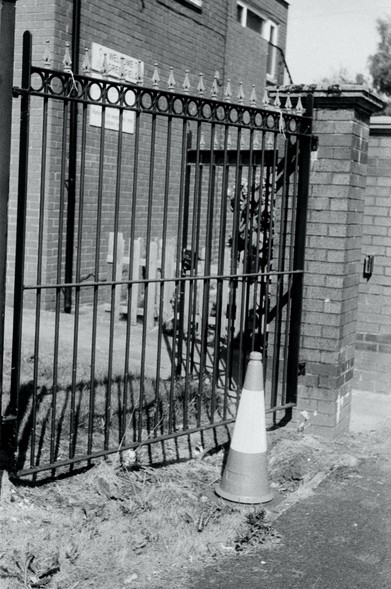 A lonesome Traffic cone, waiting to be given purpose, a reason to exist as it watches the world go by