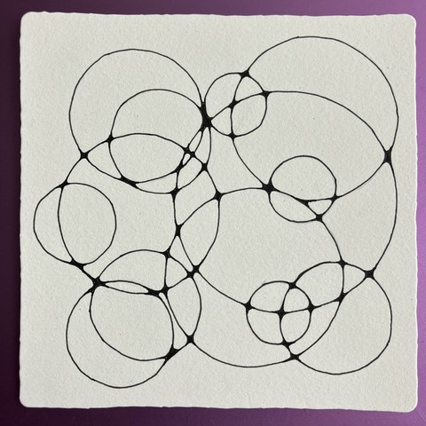 Interlocking circles with smoothed out corners at the overlapping joints