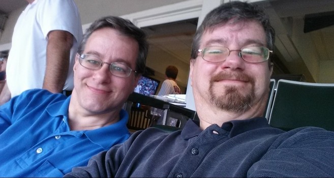 Photo of my husband and his brother, from several years ago at a baseball stadium. At the time of his stroke, my brother-in-law did not have his beard and was about the same weight as my husband, which is why the nurses were confused.