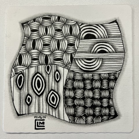 Finished tile with black ink patterns and graphite shading.
