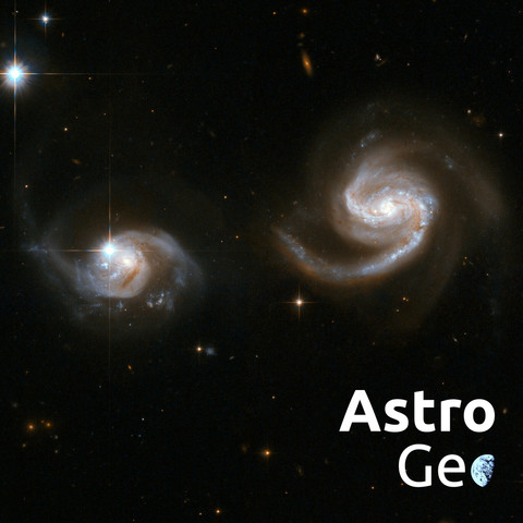 Zwei Spiralgalaxien, deren leicht geöffnete Spiralen aufeinander zuweisen. Sie kommen sich schon recht nah.