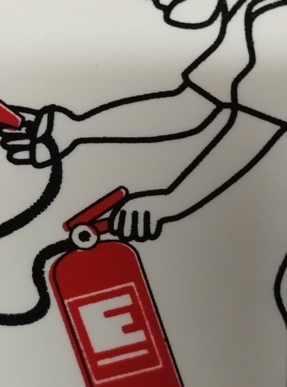 close up of hand pressing down the lower handle which is clearly wrong
