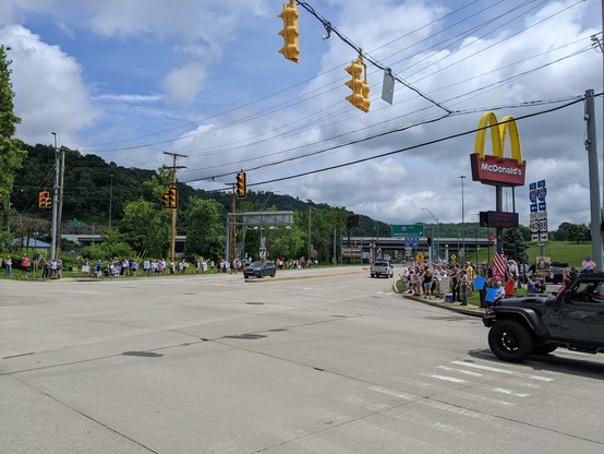 Local protest at the intersection location before moving to the march.