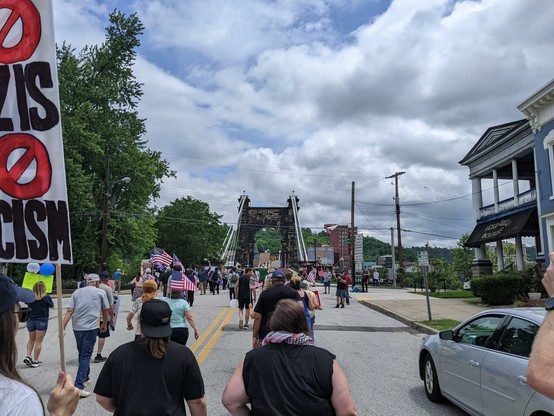 Photo of the marchers heading to the suspension bridge.
