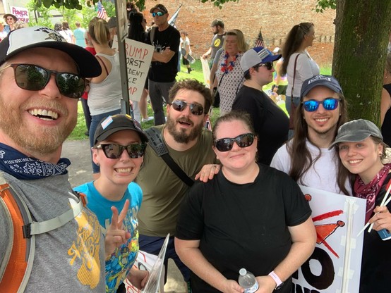 Group photo of our friends at the end of the march beginning of Pride.