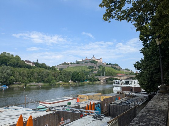 A castle atop the river Main