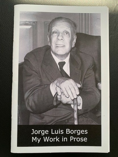 Picture of the My Work in Prose booklet. The cover features a black and white photo of Borges seated, leaning on a walking stick.