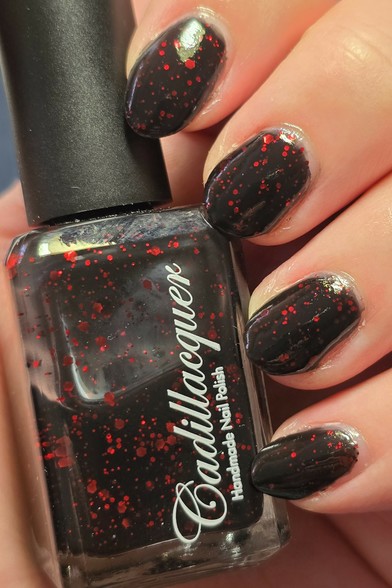 My fingers curled around the nail polish bottle