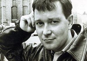 Black and white photograph of playwright Joe Orton