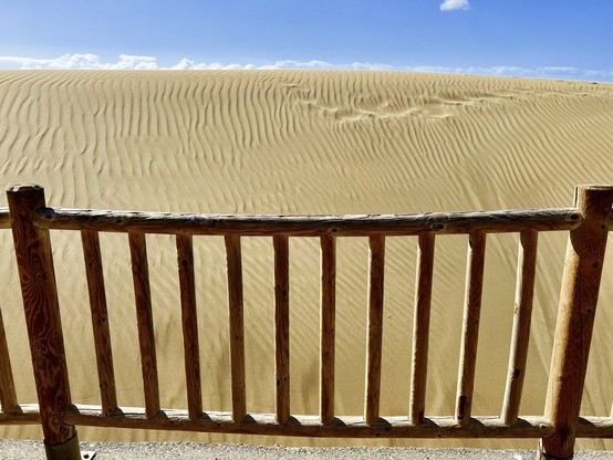 While it make look like a balcony looking out into the glorious Maspalomas sand dunes on a fabulous spring day of blue skies all around, it's a minimalist snap shot of a longer fence supposed to protect the natural reserve from people entering the natural space. I always like to think of it as my own balcony into a majestic view though as I walk through day in day out. I can never get tired of it for the last 21 years and still going strong ... 😎👍🏻
