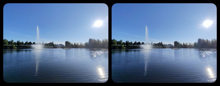 Stereoscopic image of a fountain in a lake. Sunny day.