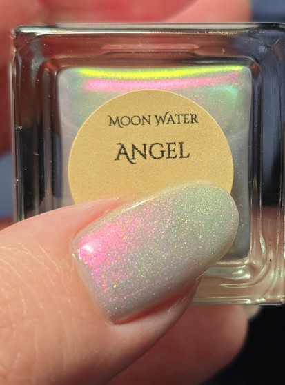 My thumb on the name tag of the nail polish bottle