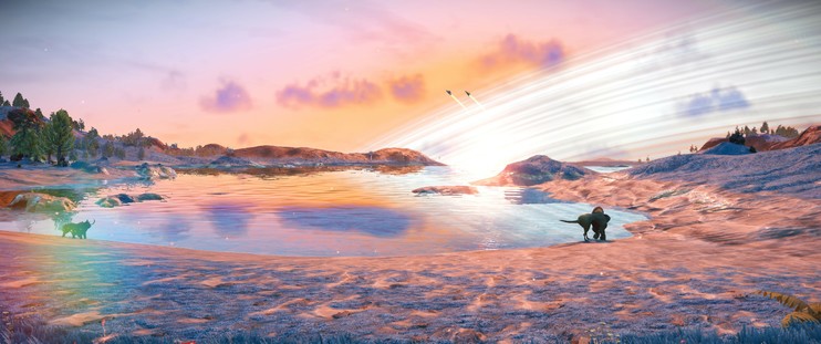 The image depicts a serene landscape of an alien world at sunset, with a large body of water reflecting the warm hues of the sky. The sky is painted with soft pinks, oranges, and purples, creating a tranquil atmosphere. Wispy clouds are scattered across the sky, and the sun is setting on the horizon, casting a glow over the scene. A small arc of planetary rings can be seen rising from the middle of the horizon at a steep angle to the right before ending off the right side of the image. The water is calm, with gentle ripples, and reflects the colors of the sky, enhancing the overall beauty of the scene.

In the foreground, there are two large, dark-colored animals standing on the sandy shore, facing along the water's edge to the right. They are quadrupedal with large chests, small waists, thick forelegs, and thin digitigrade hind legs. The one on the right has a thin, straight tail and a small curved sail on its back. Its head is facing the water and thus hard to see. The one on the left side of the image is smaller, has no visible tail, a short, and a stocky head with thin horns that curve upward.

The sandy terrain is interspersed with patches of grass and small rocks. The landscape is dotted with trees and hills in the background, adding depth to the scene. The overall composition is balanced, with the animals providing a focal point against the expansive backdrop of the sky and water.

Two distant space ships can be seen rising over the rings toward the left.