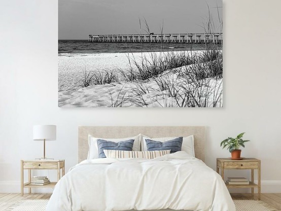 The quiet and peacefulness of an early morning before sunrise at Navarre Beach, Florida, United States in black and white. In this beach photograph I focused on the fishing pier through some small sand dunes with sea oats grass @fineartamerica 
https://5-jennifer-white.pixels.com/featured/navarre-florida-pier-behind-sea-oats-grayscale-jennifer-white.html
#photography #buyintoart #beachphotography #interiordesign #artforsale