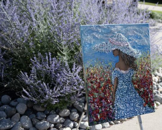 Artwork titled 'The Blue Muse's Secret'    by Lena Owens, an acrylic painting on canvas featuring a graceful figure in a blue dress and hat, surrounded by vibrant meadow flowers with impasto texture. Available for $550 on Artfinder, with free returns and 4-day U.S. shipping.