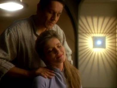Chakotay massaging Janeway’s shoulders