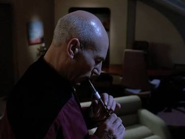 Picard playing a flute