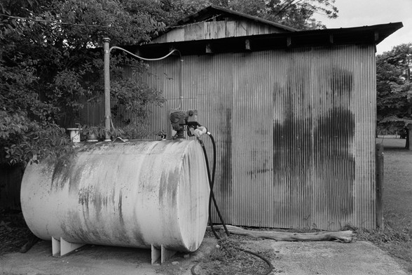 Nikon F100 | Nikon 28-300 3.5-5.6 | Kodak Tri-X 400 400 @ 320

Home developed in XTOL Stock | 6:00 @ 22C | Rotation

A fuel tank next to a tractor shed