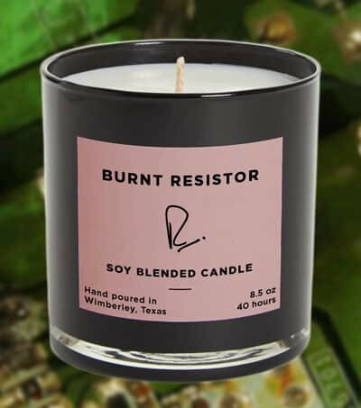photograph of a scented candle with a label saying "Burnt resistor"