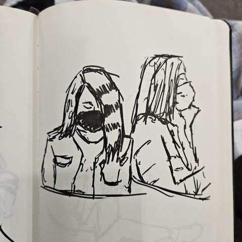 Loose gesture drawings with a brush pen of 2 people wearing kn94 masks in a drs office waitingroom