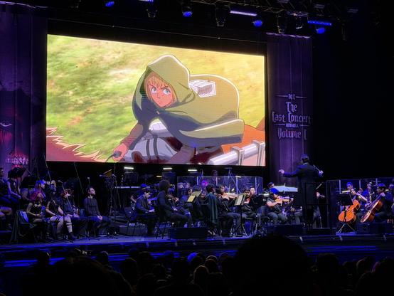 A live orchestra playing songs from the anime Attack on Titan.