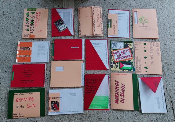 17 printouts from the library with custom made covers by participants