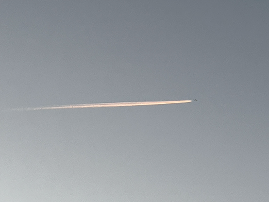 An airplane in the blue evening sky over Wolfenbüttel/Germany