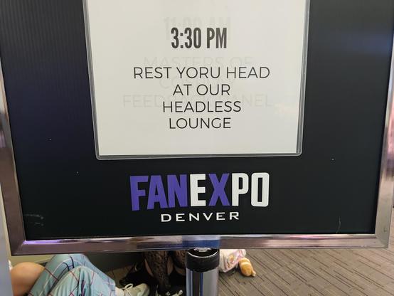 A FanExpo Denver schedule sign reading 3:30 PM : Rest your head at our headless lounge.