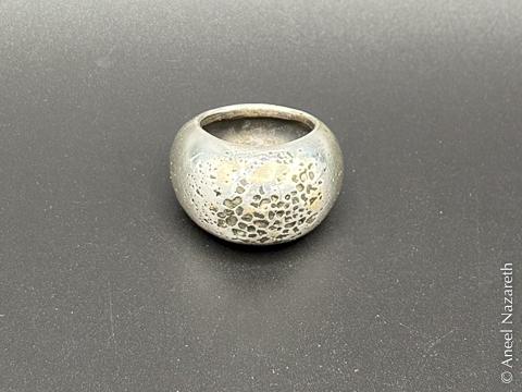 Another view of the ring without the glass