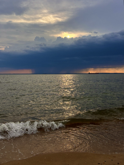 Dark clouds over the bay as storms roll in.