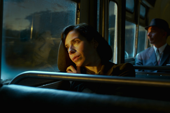 Sally Hawkins in "the Shape of Water" stares wistfully out the window