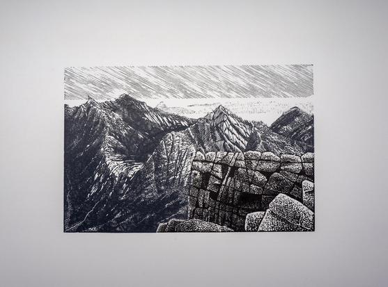 Print in grey and black inks of a wood engraving. A view across a vertical rock buttress to rocky mountains and ridges, with lowlands and sea beyond.