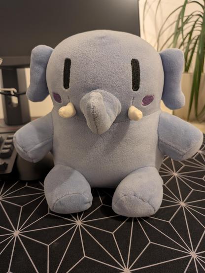 A blue mastodon plushie looking really cute. Taken with a Google Pixel 10a.