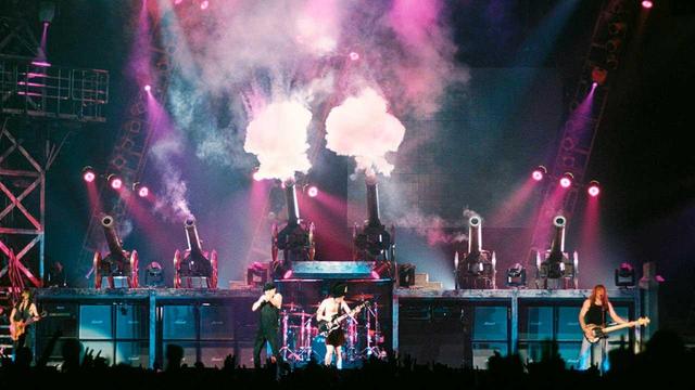 AC/DC on stage, playing _For those about to rock_ , cannon fire included.