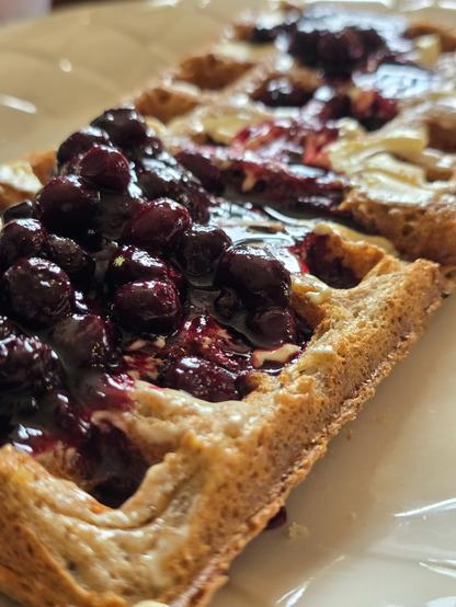 Blueberry compote syrup over vegan waffle