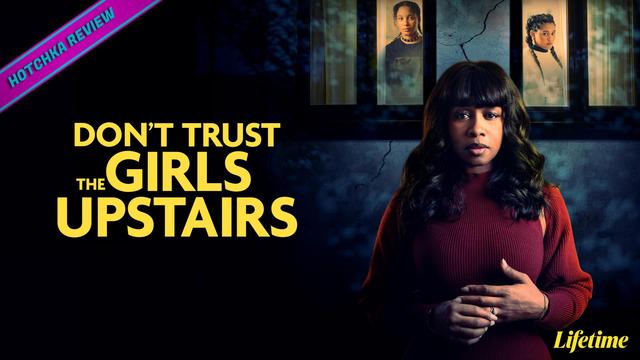 Hotchka Review: Don't Trust the Girls Upstairs. Black woman with bangs stands outside of a house at night, wearing a red sweater, hands at her midsection, with a serious expression. Two young girls are seen in the upper floor windows. The Lifetime network logo in yellow is at the bottom right.
