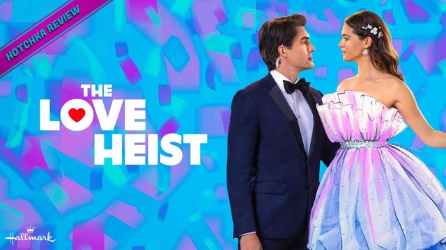Hotchka Review: The Love Heist. A man in a black tuxedo and bow tie gazes at a woman in a pink ball gown against a blue confetti backdrop. The O in the word love is heart-shaped and filled with the color red. The Hallmark network logo in white is at the bottom left.