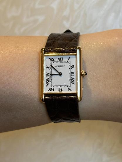 Wrist shot of a Cartier Tank Louis.