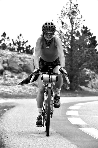 Black and white frontal picture of me cycling.