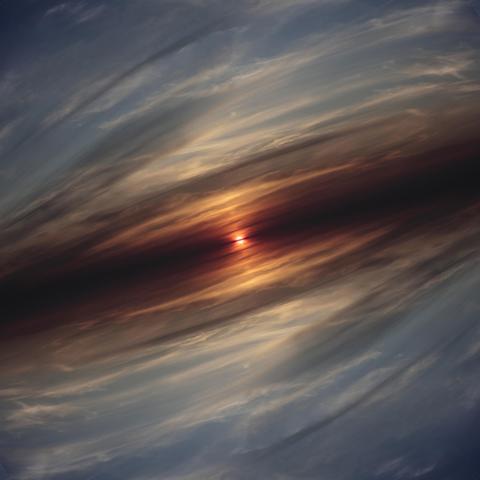 Dramatic cloudy sunset, horizon tilted and mirrored