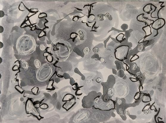Monochrome layers of marks, mostly circular and scribbly. A bit like lichen.