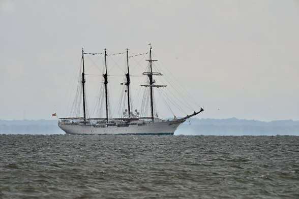 The tall ship Juan Sebastian de Elcano from Spain sailing on the Chesapeake bay on a rainy afternoon.