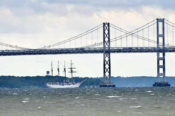 The tall ship Juan Sebastian de Elcano from Spain approaching the Chesapeake bay bridge.