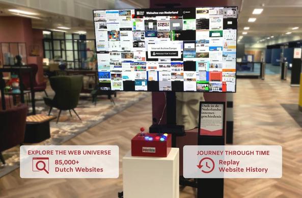 The Internet Archive Europe "Websites van Nederland" interactive kiosk installed in a public space, featuring a large screen displaying a mosaic of archived Dutch website screenshots with a "Press Button to Start" prompt, and a red arcade-style controller box with colored buttons and joystick on a white pedestal. A secondary information panel in Dutch stands alongside. Overlaid text reads "Explore the Web Universe: 85,000+ Dutch Websites" and "Journey Through Time: Replay Website History." Photo: Preserving Digital Sovereignty: Marleen Stikker & Brewster Kahle at the KB by Sebastiaan ter Burg, CC BY 4.0