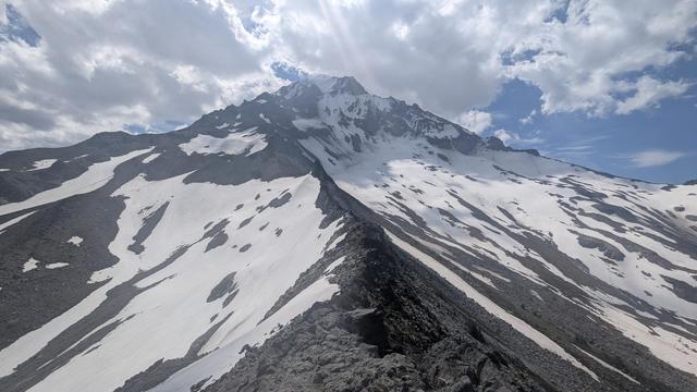 Mt. Hood with half snow as seen from cathedral ridge above McNeil point